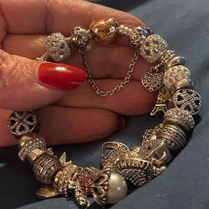 AUTHENTIC PANDORA BRACELET WITH 30 AUTHENTIC PANDORA CHARMS - 8 in”